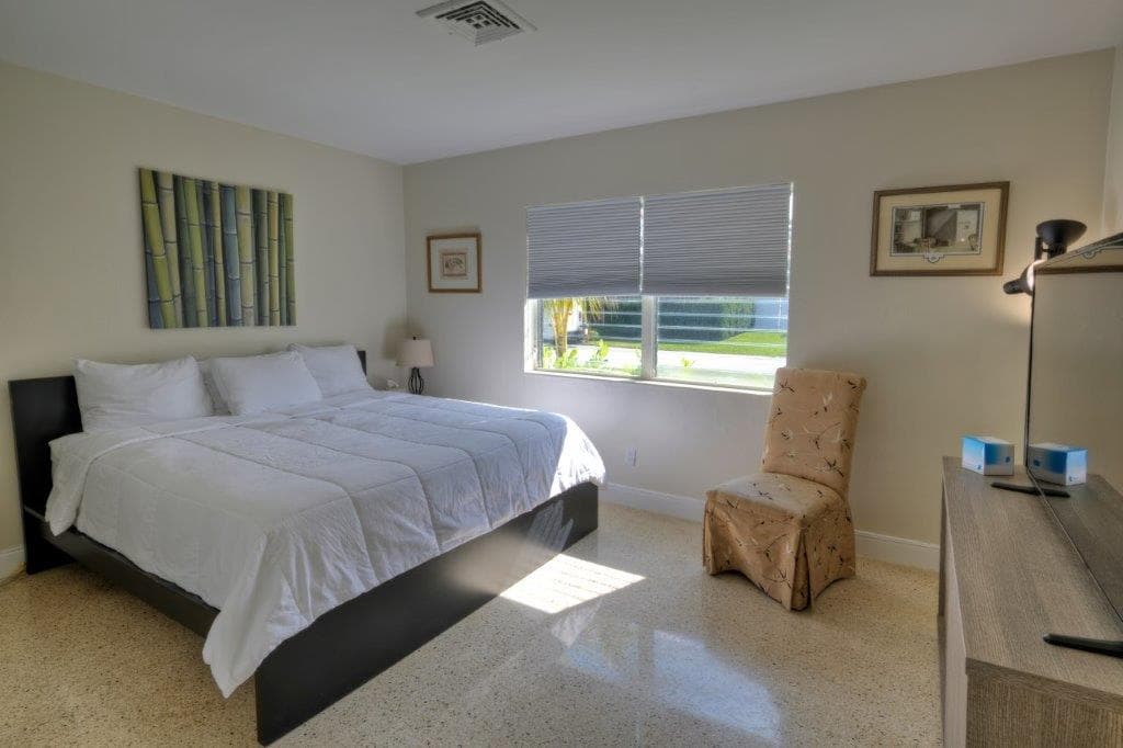 Second bedroom at Dolphin Isles Suites Hotel with modern decor